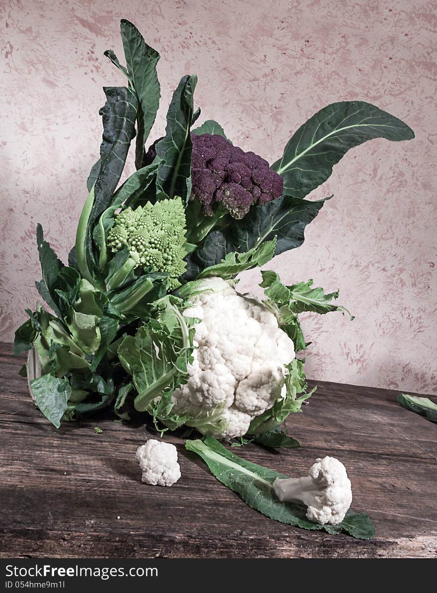 Cauliflower cabbage on wooden cutting board