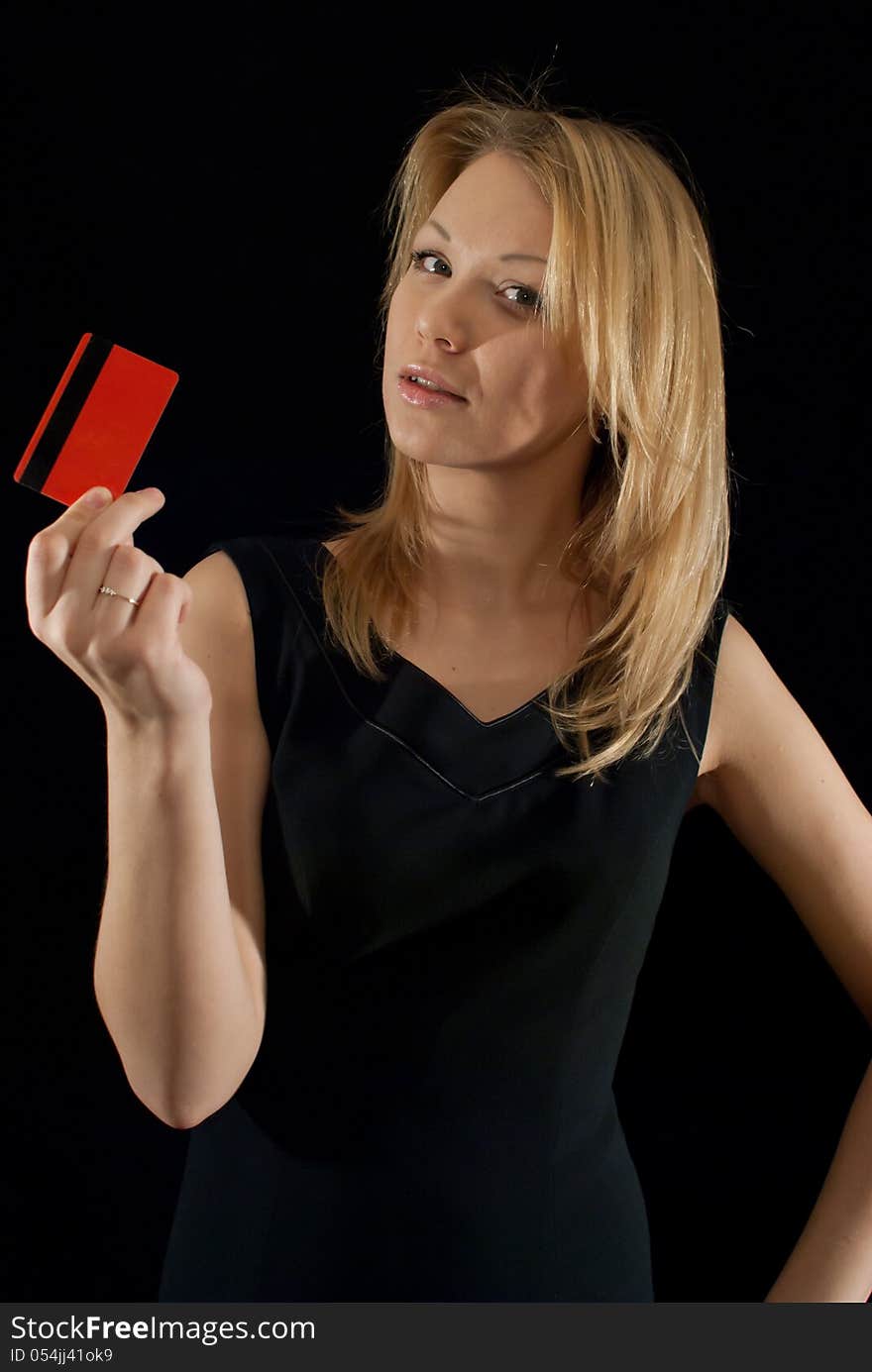 Girl with credit card posing in studio. Girl with credit card posing in studio