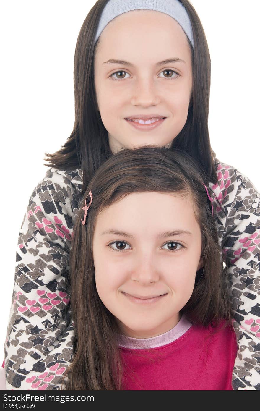 Two young girls smiling