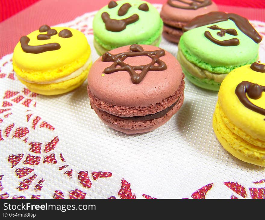 Close up of Macaroons with chocolate graphics on them. Close up of Macaroons with chocolate graphics on them