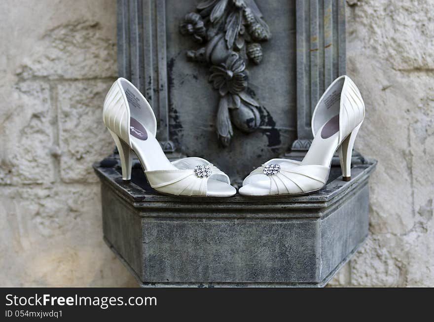 Wedding Shoes With Stone Wall & Sculpture