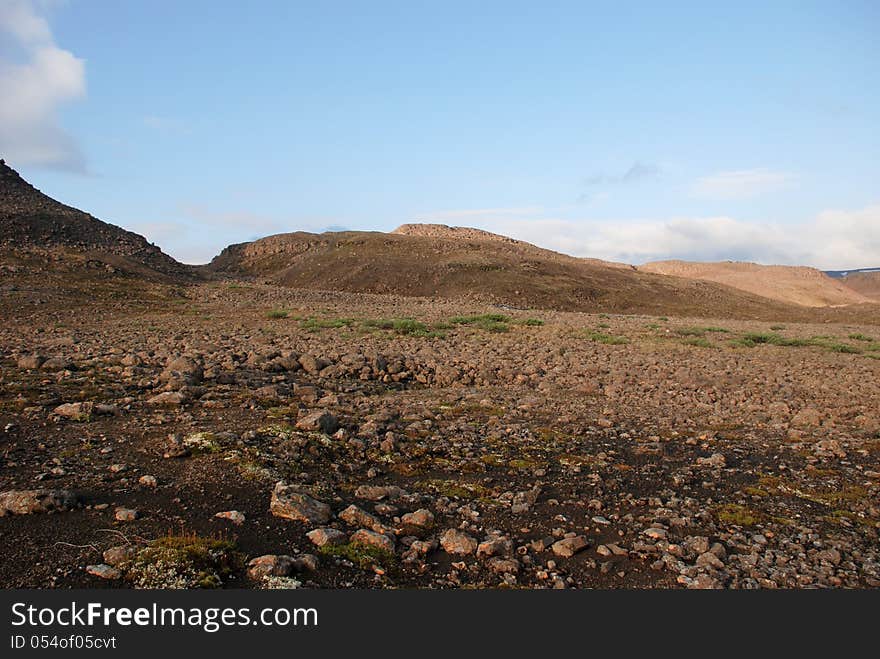 Rocky landscape on the Putorana plateau. The origins of the river Bucharama. Russia, Taimyr Peninsula. Rocky landscape on the Putorana plateau. The origins of the river Bucharama. Russia, Taimyr Peninsula.