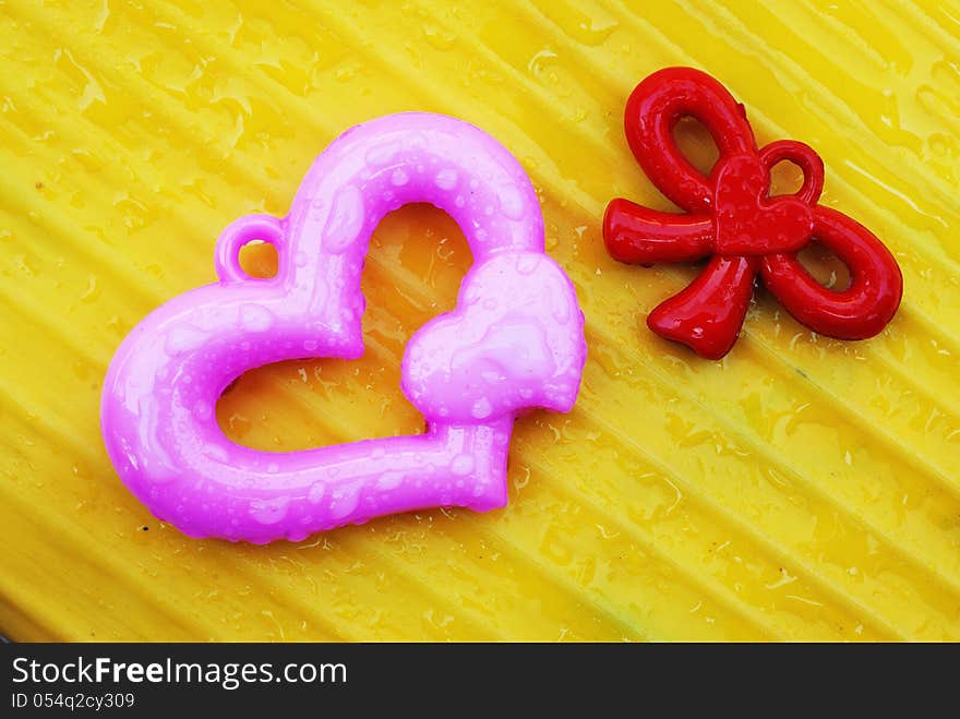 Pink And Red Heart On Yellow Background