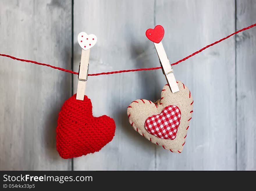 Photo of fabric heart on wooden background