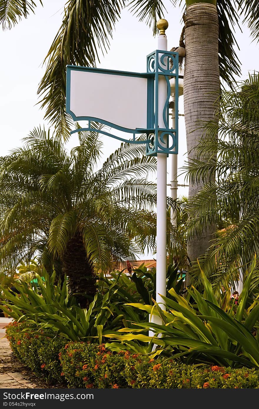 Blank sign in a tropical environment