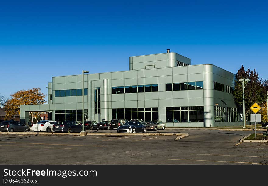 Modern building in downtown Laval with a blue sky. Modern building in downtown Laval with a blue sky