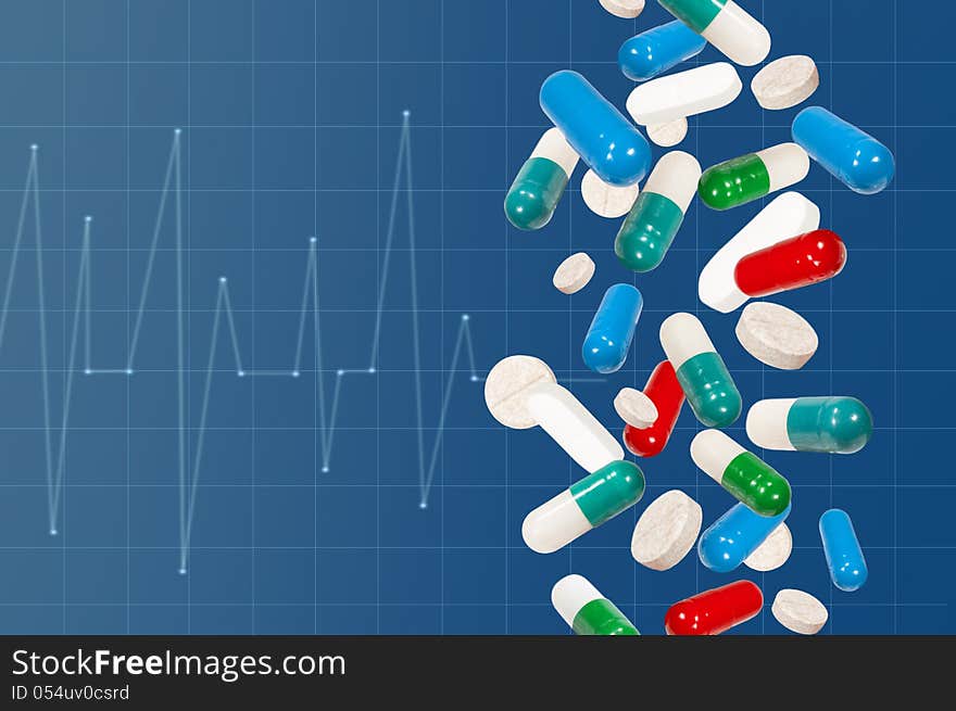 Medical background with pills and cardiogram