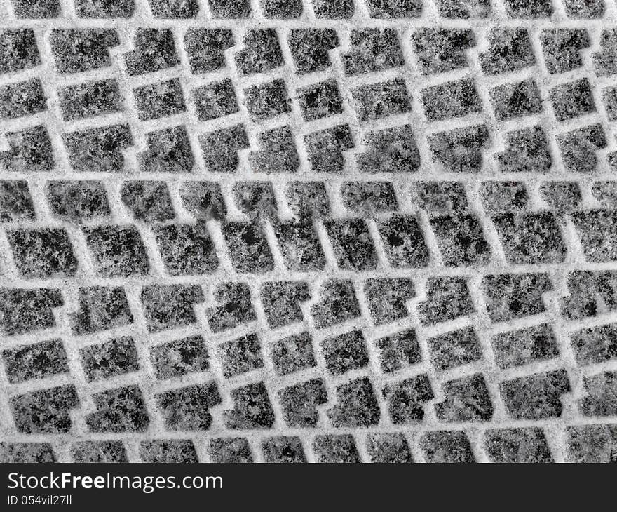 Close-up of car tire tread, tracks in the snow. Suitable for background. Close-up of car tire tread, tracks in the snow. Suitable for background.