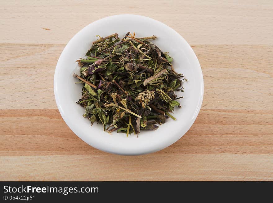 Herbal plant on a table of beech. Herbal plant on a table of beech