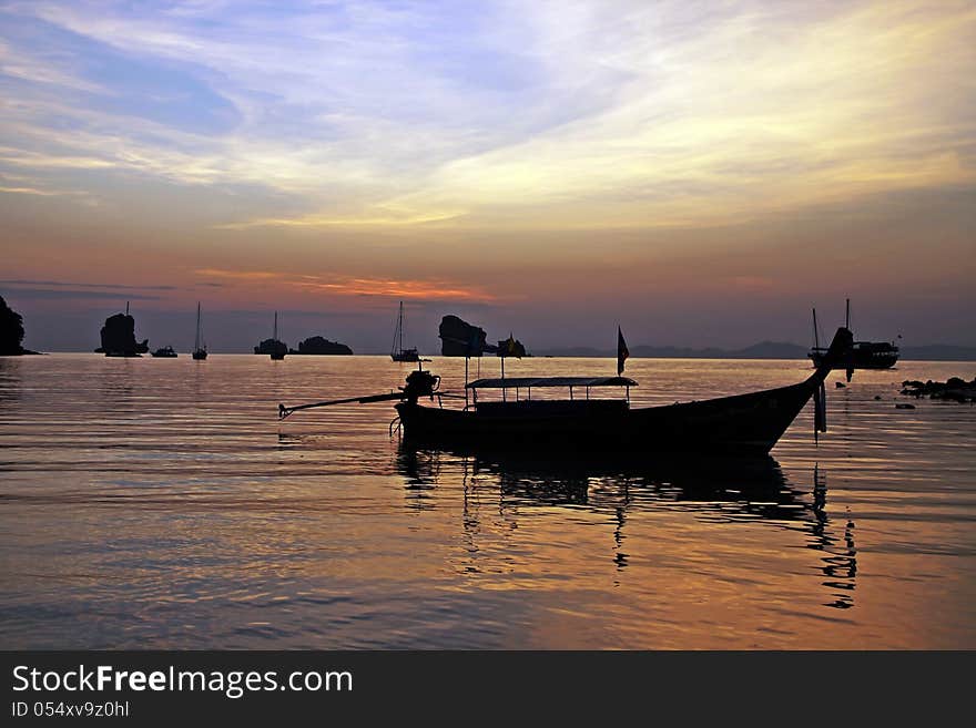 Lonely fisherboat in quiet waters near Krabi beach Thailand. Lonely fisherboat in quiet waters near Krabi beach Thailand