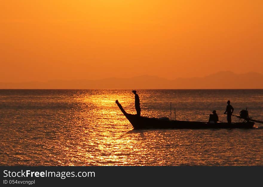 Fisherboat at sunset