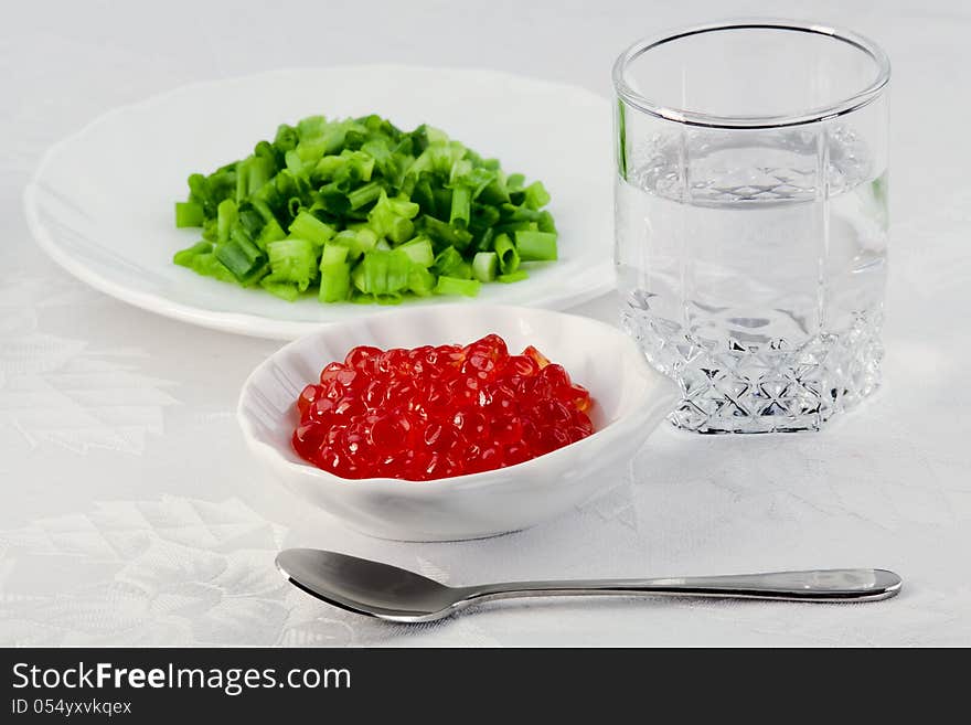 A Small Glass With Vodka And Snack