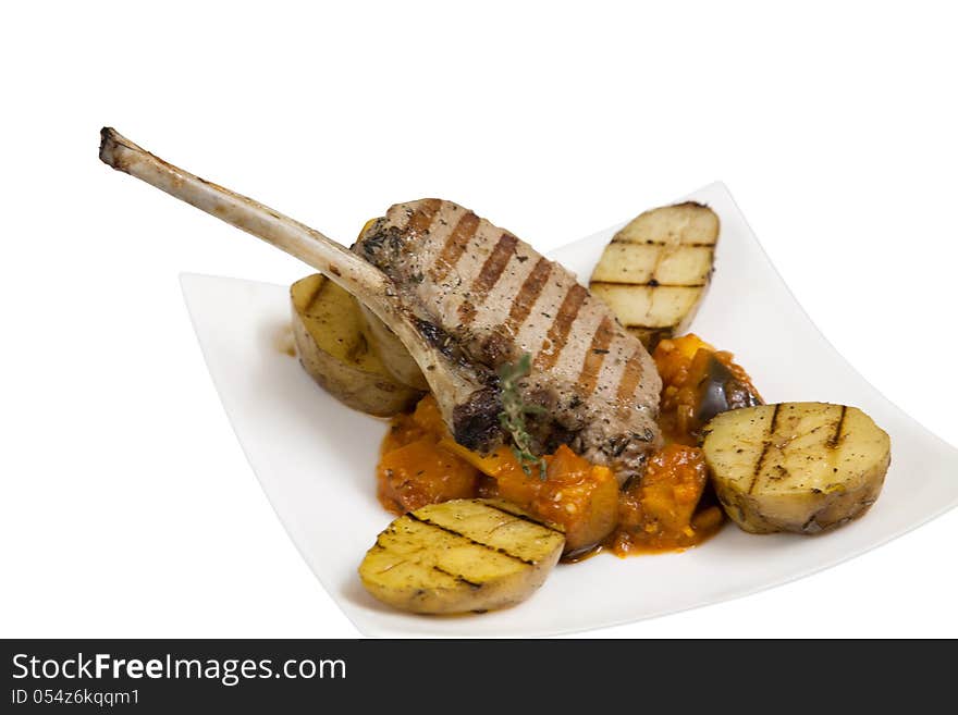 Roast lamb on the bone with potatoes