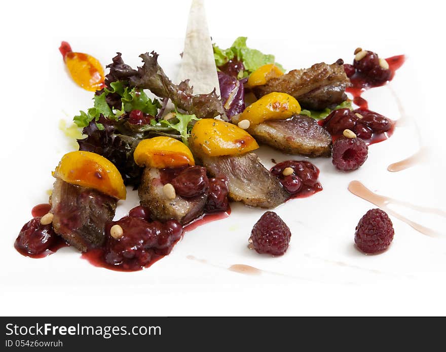 Lamb with fruit and berry sauce