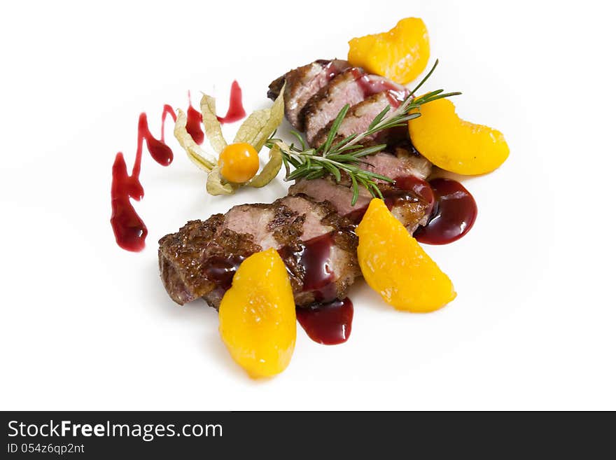 Lamb with fruit and berry sauce