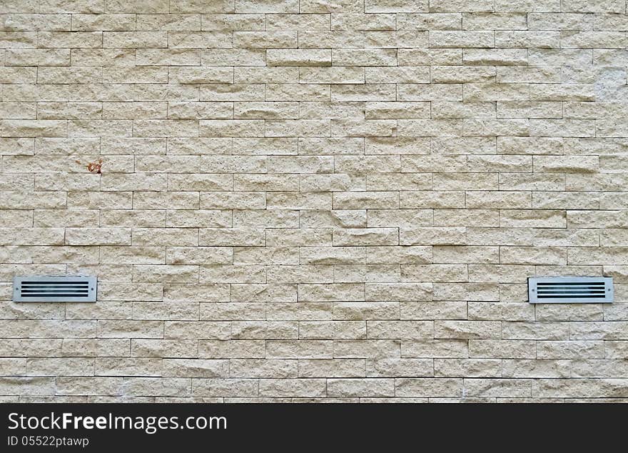 White brick wall with twin ventilator. White brick wall with twin ventilator