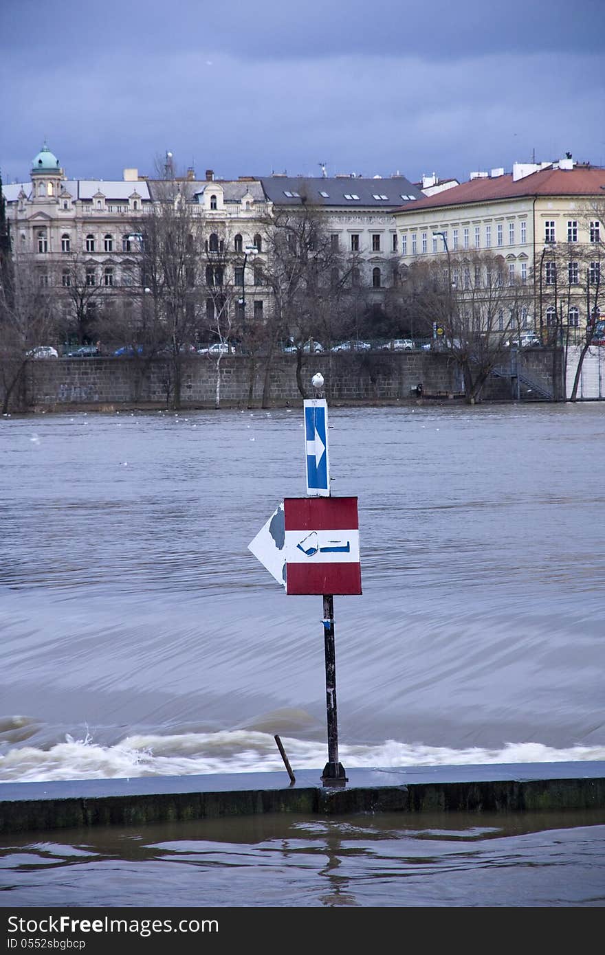 Shipping label on the flooded river vltava in prague