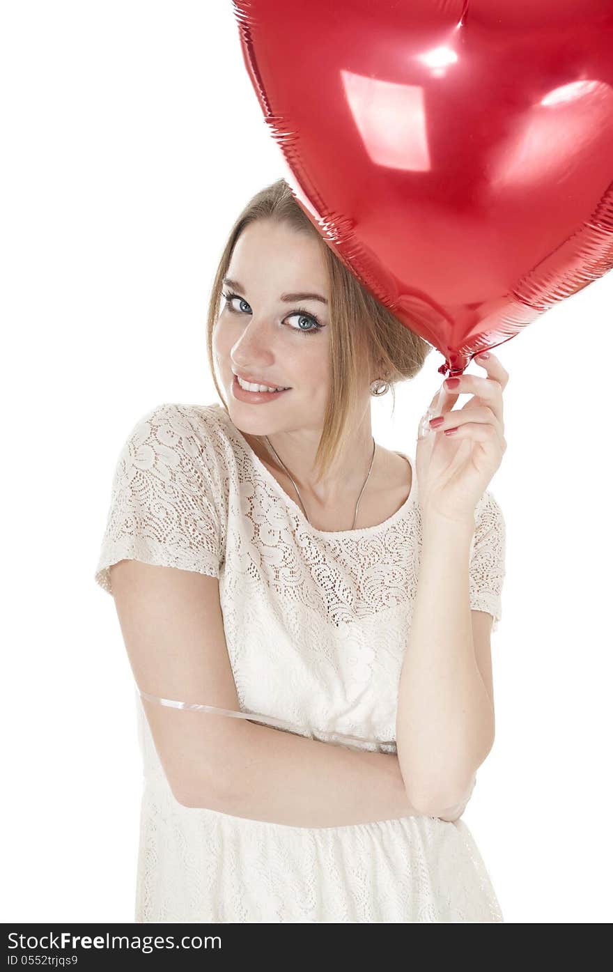 Beautiful Woman Holding Red Heart Balloon Over White Background.