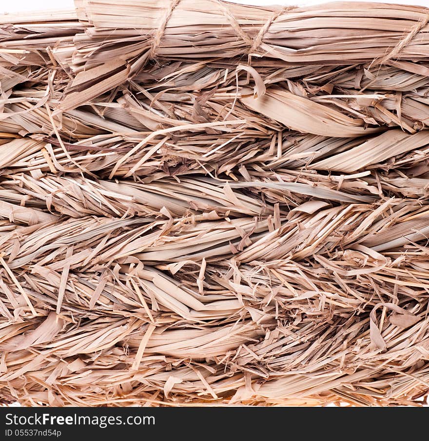 Texture of a straw basket closeup horizontal