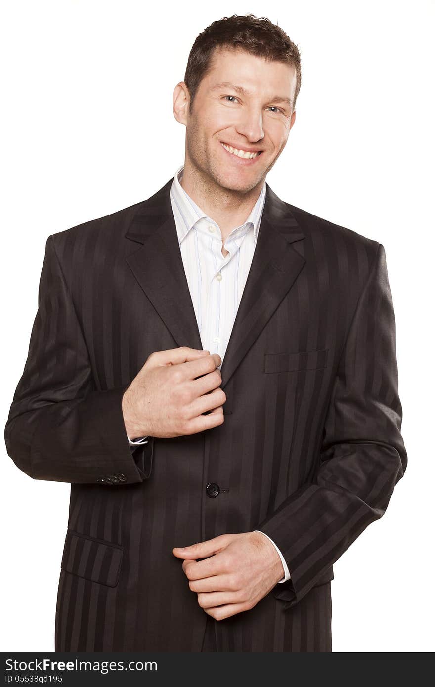 Portrait of a businessman smiling, on white background