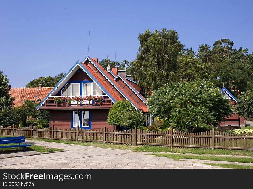 Traditional wooden house in Nida, Lithuania. Traditional wooden house in Nida, Lithuania