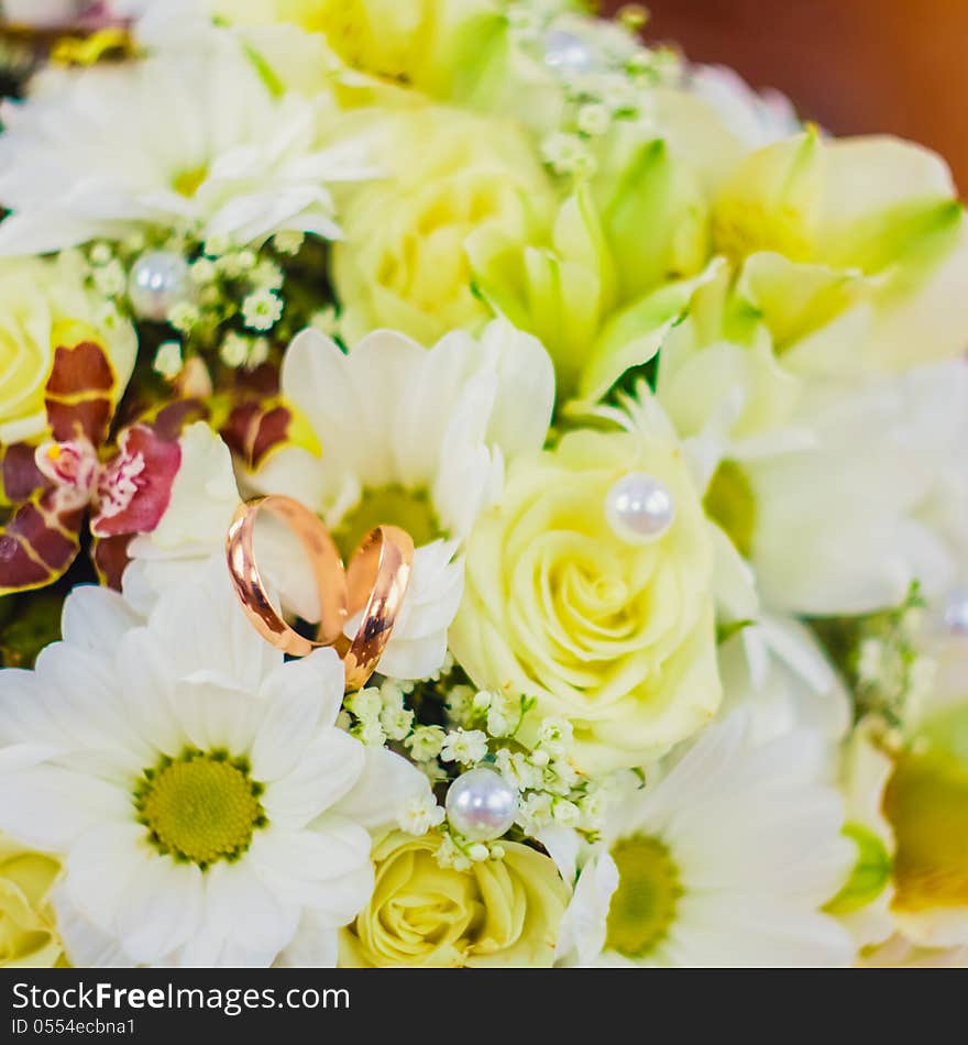 Wedding rings in a bucket