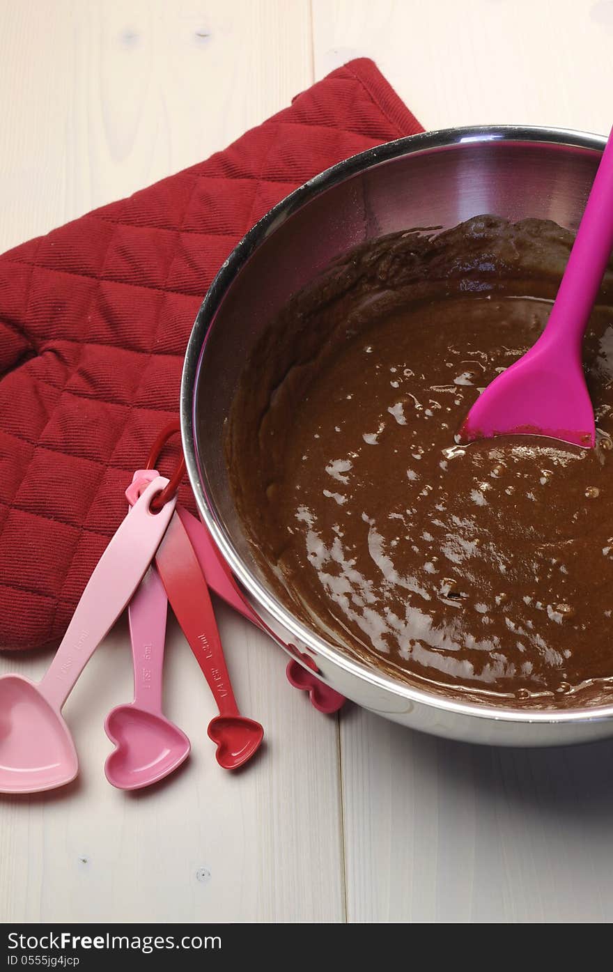 Love themed chocolate cake mix and baking accessories. Vertical.