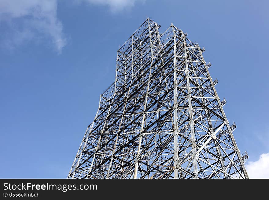 Abstract steel construction with blue sky and clouds. Abstract steel construction with blue sky and clouds