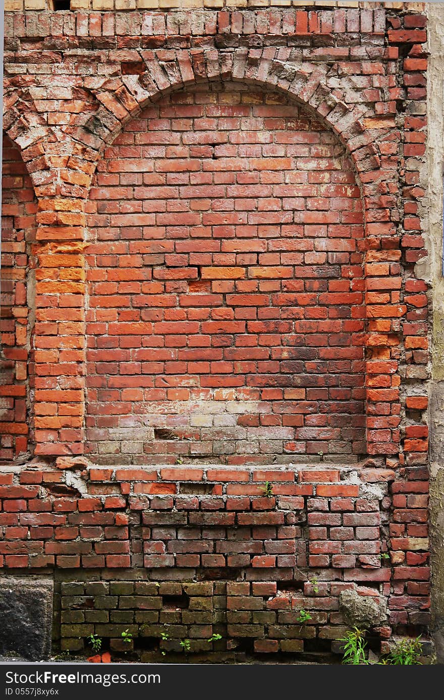 Red brick wall of the old medieval houses