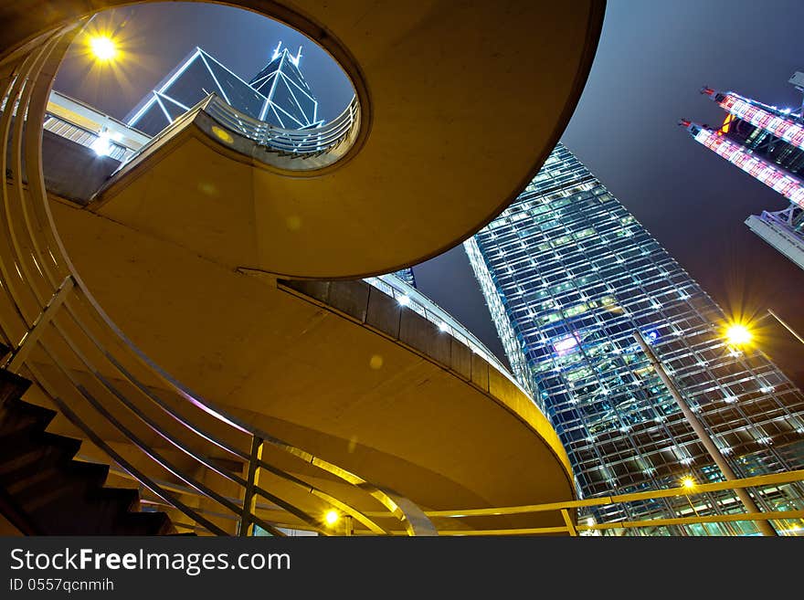 A view of the lights and skyscrapers in downtown Hong Kong at night