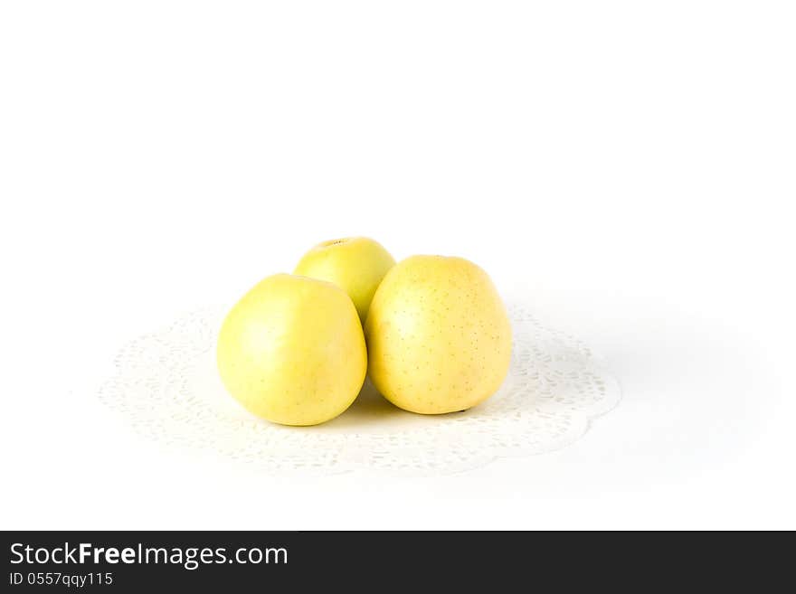 Yellow apples on a white background. Useful product. Vitamins.