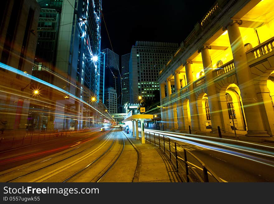 A view of the lights and skyscrapers in downtown Hong Kong at night