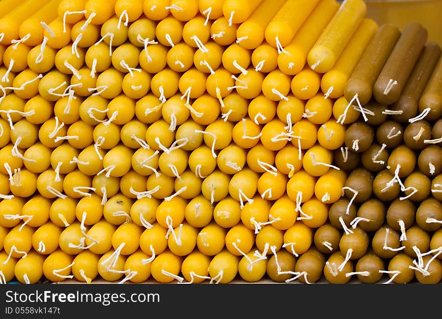 Yellow candles - a background. Yellow candles - a background.