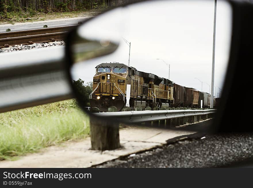 Train in Car Side Mirror