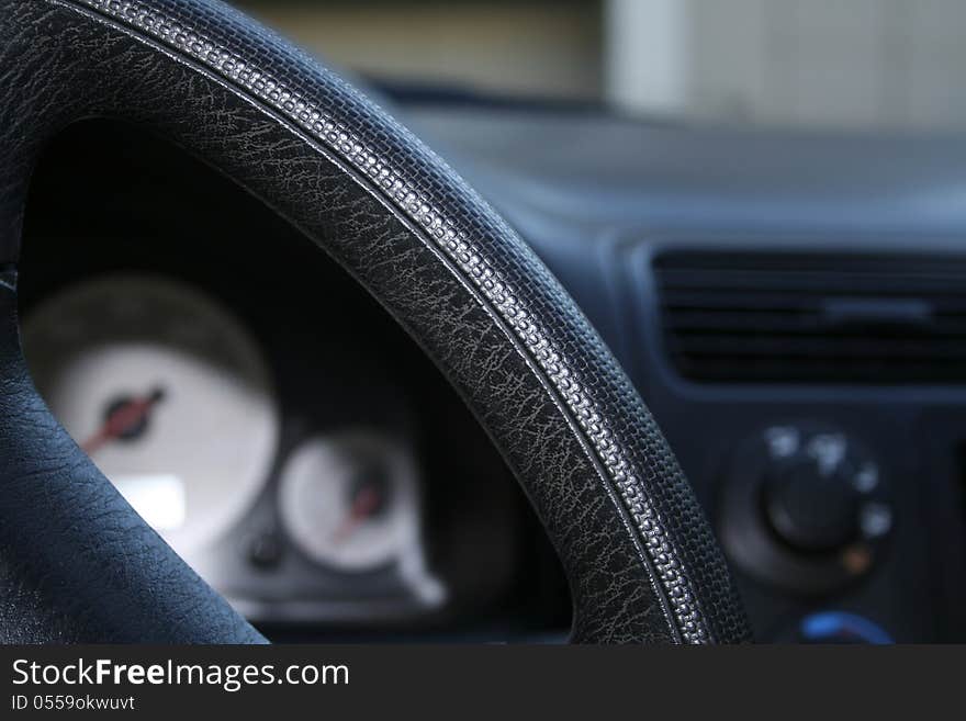 Cropped shot of a steering wheel.