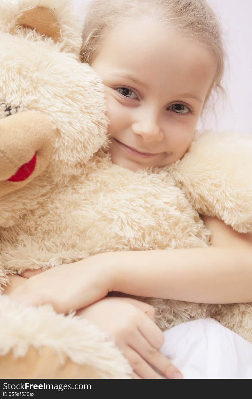 Natural Close Up Portrait Of Little Blond Girl