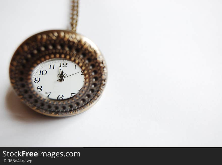 Golden Old Pocket watch, showing twelve o'clock