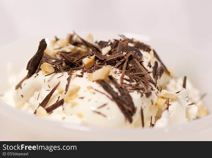 Dessert with cream, chocolate and nuts