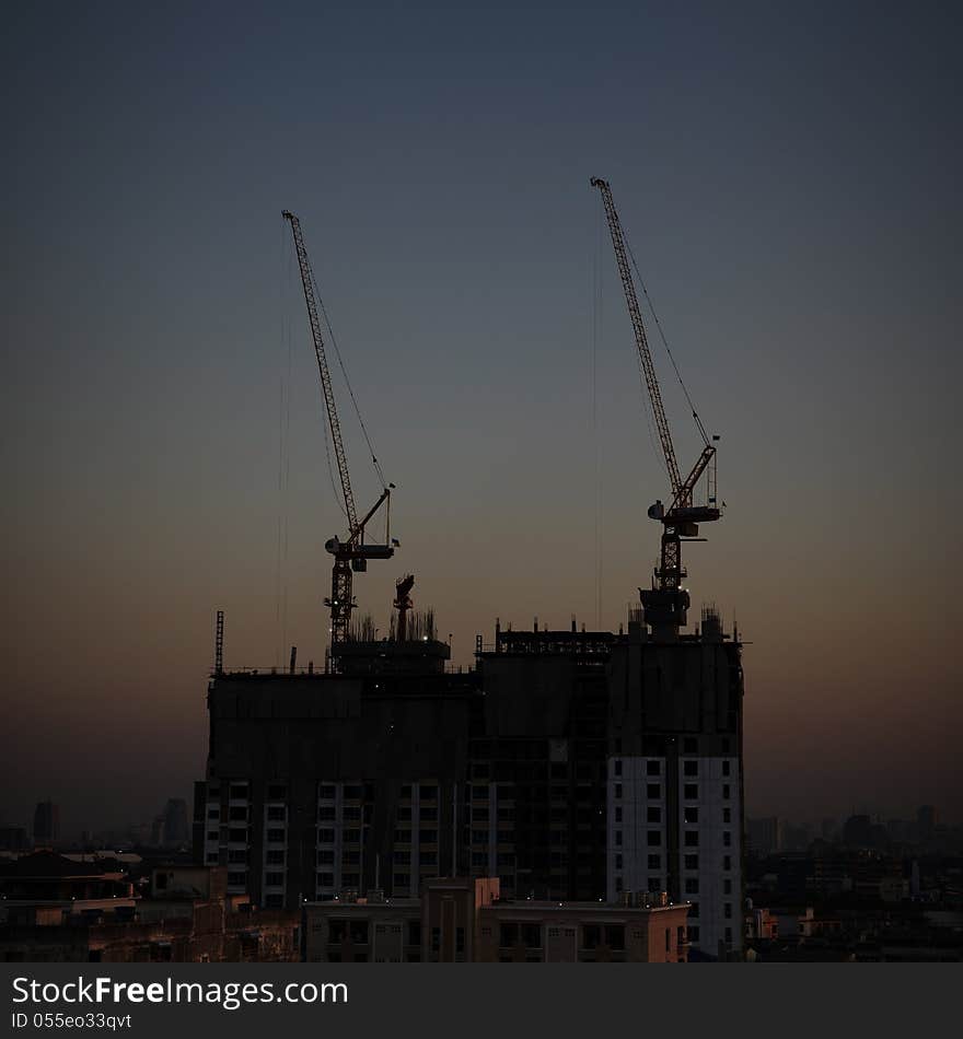 Buildings under construction at night