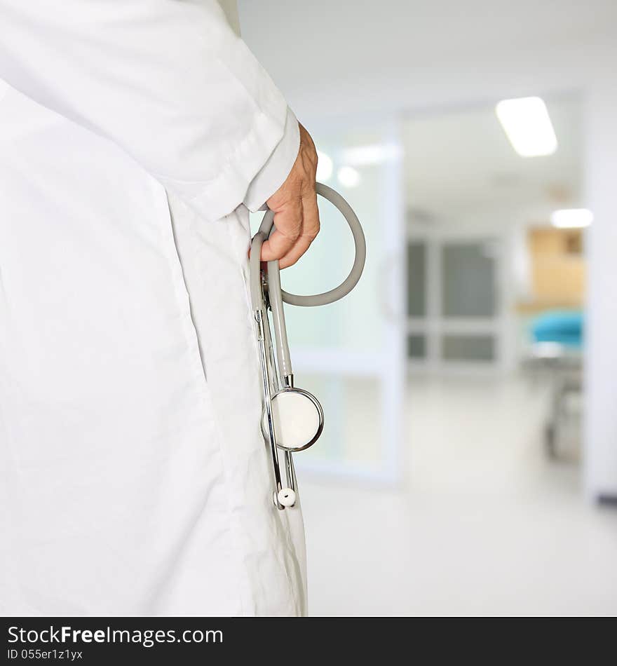 Cropped view of doctor holding stethoscope. Cropped view of doctor holding stethoscope