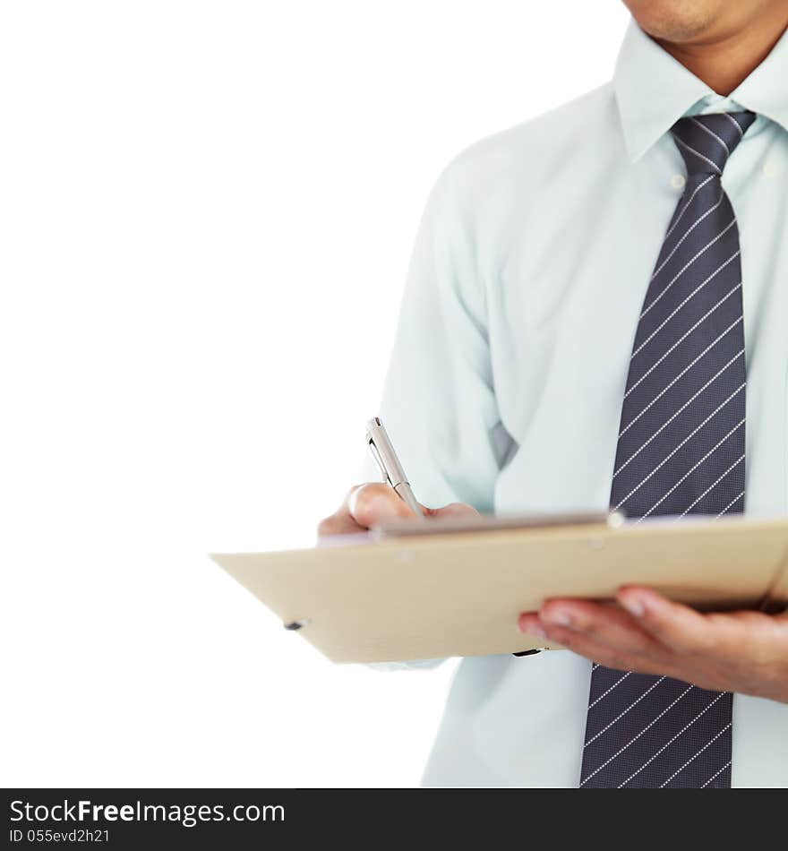 Businessman signing a document On a white background