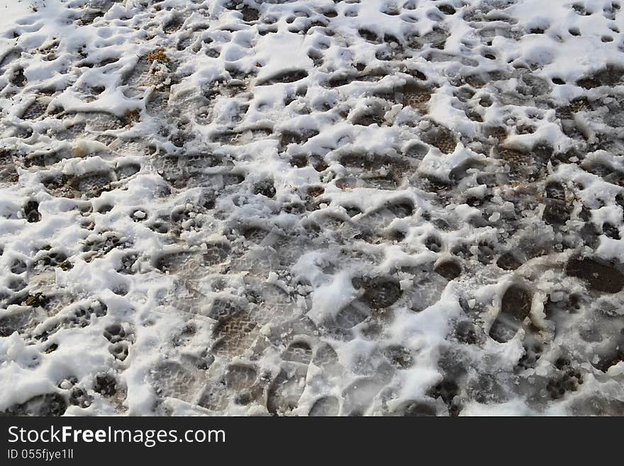 Foot prints in the snow background