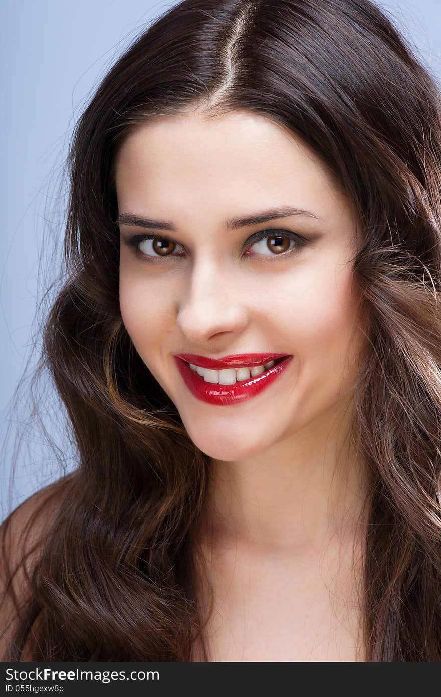 Portrait of brunette with red lips. Close up. Portrait of brunette with red lips. Close up