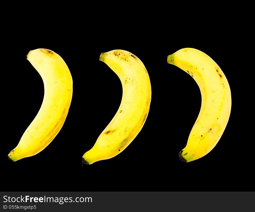 Ripe bananas  on black background