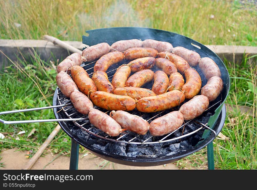 Grilled sausage scented herbs to eat.