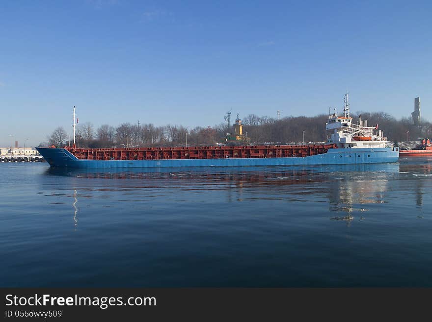 Container ship leave port of Gdansk