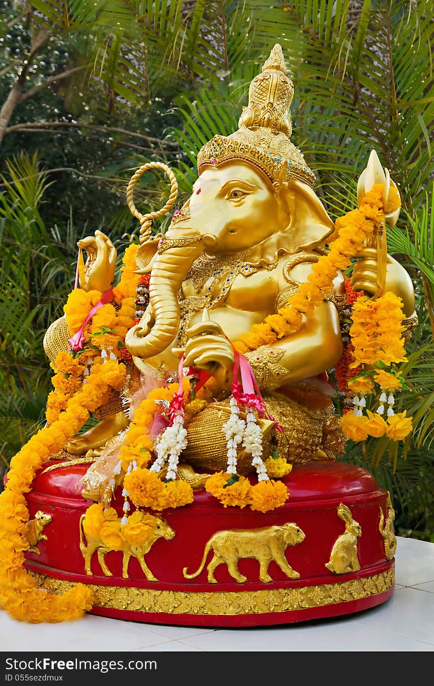 Lord Ganesha statue decorated with flowers