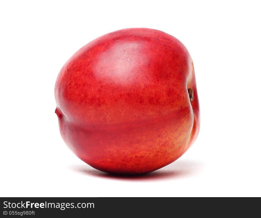 Single nectarine isolated on a white background