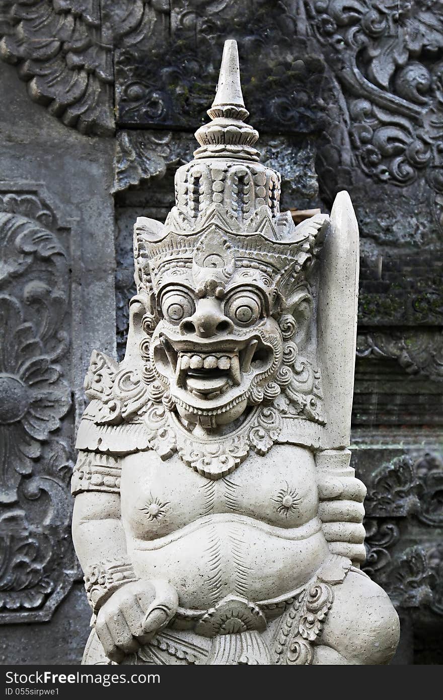 BALI, INDONESIA - FEBRUARY 17: Ornate monster statue at Ulun Danu temple on February, 17, 2011, Bali, Indonesia. BALI, INDONESIA - FEBRUARY 17: Ornate monster statue at Ulun Danu temple on February, 17, 2011, Bali, Indonesia