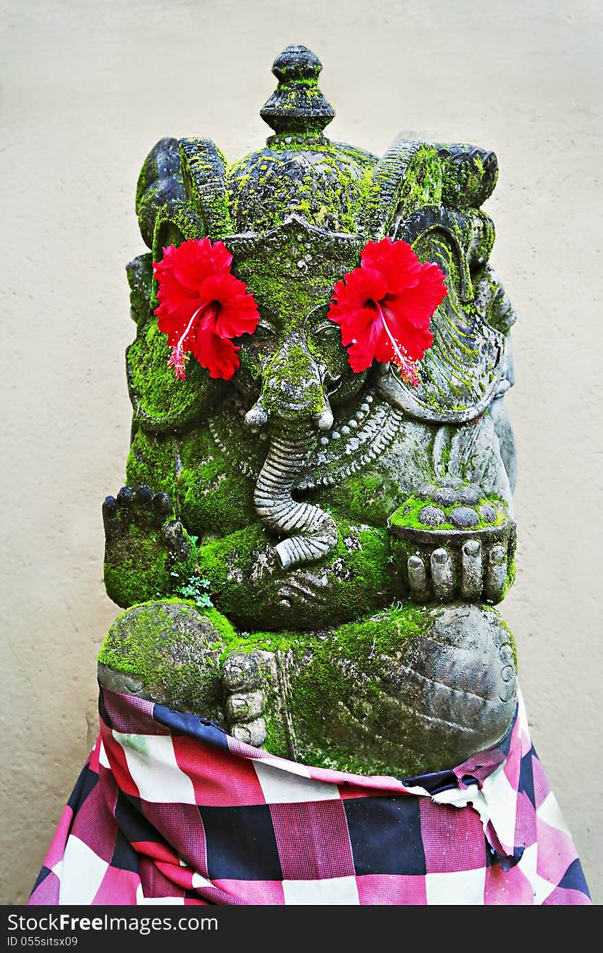 BALI, INDONESIA - FEBRUARY 17: Ornate monster statue at Ulun Danu temple on February, 17, 2011, Bali, Indonesia. BALI, INDONESIA - FEBRUARY 17: Ornate monster statue at Ulun Danu temple on February, 17, 2011, Bali, Indonesia